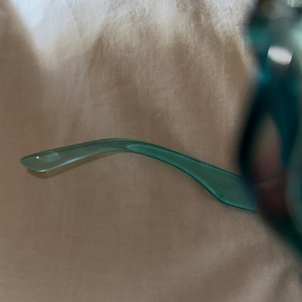 Prada Transparent Teal Sunglasses View 3